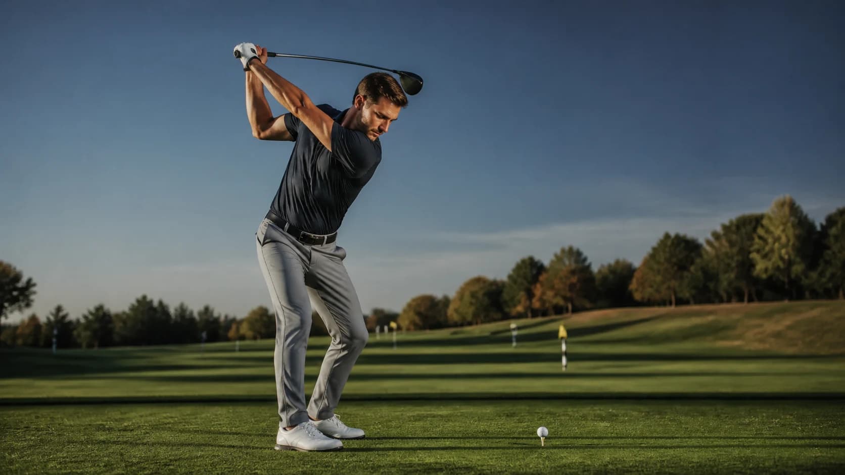 Golfer captured from the side during a driver swing